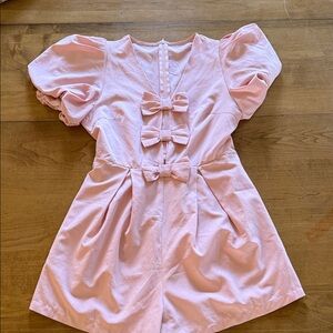 Charming Pink Romper with Bow Accents
